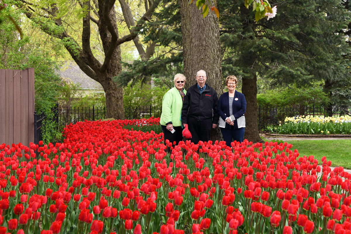 220 Linda Dose, Allen Larson, Bonnie Wilshusen in Scholte Garden in Pella.JPG